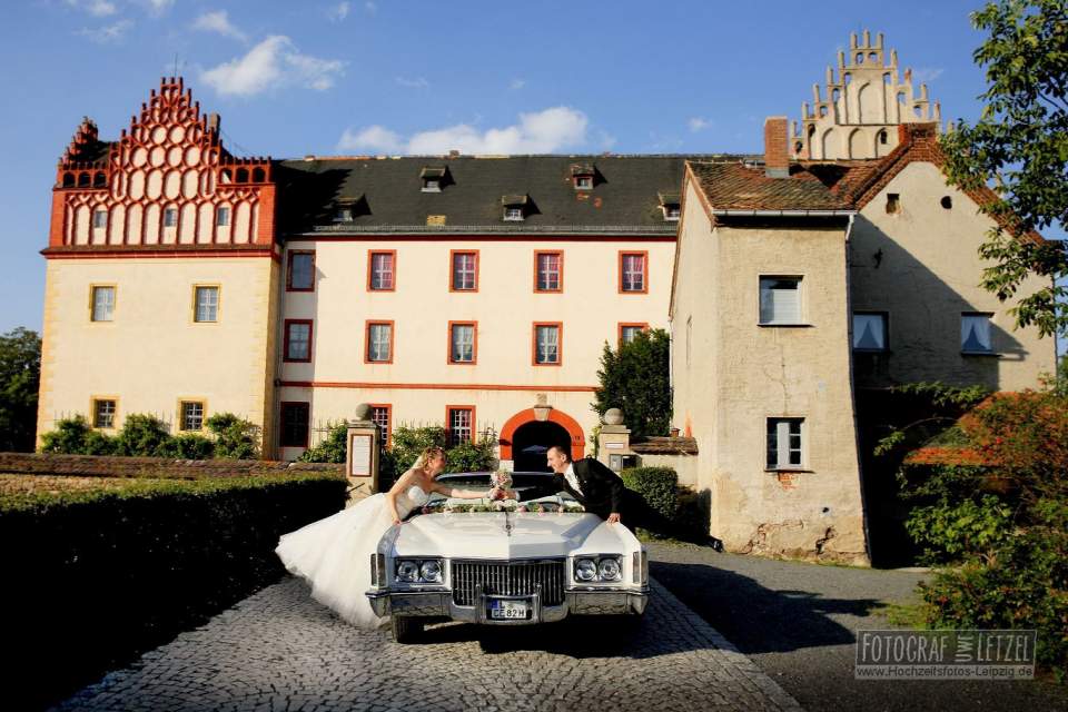 Foto: Hochzeitsfahrt Cadillac US Cabrio am Schloss Trebsen 